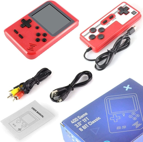 Red handheld gaming console with controller, cables, and packaging on a white background