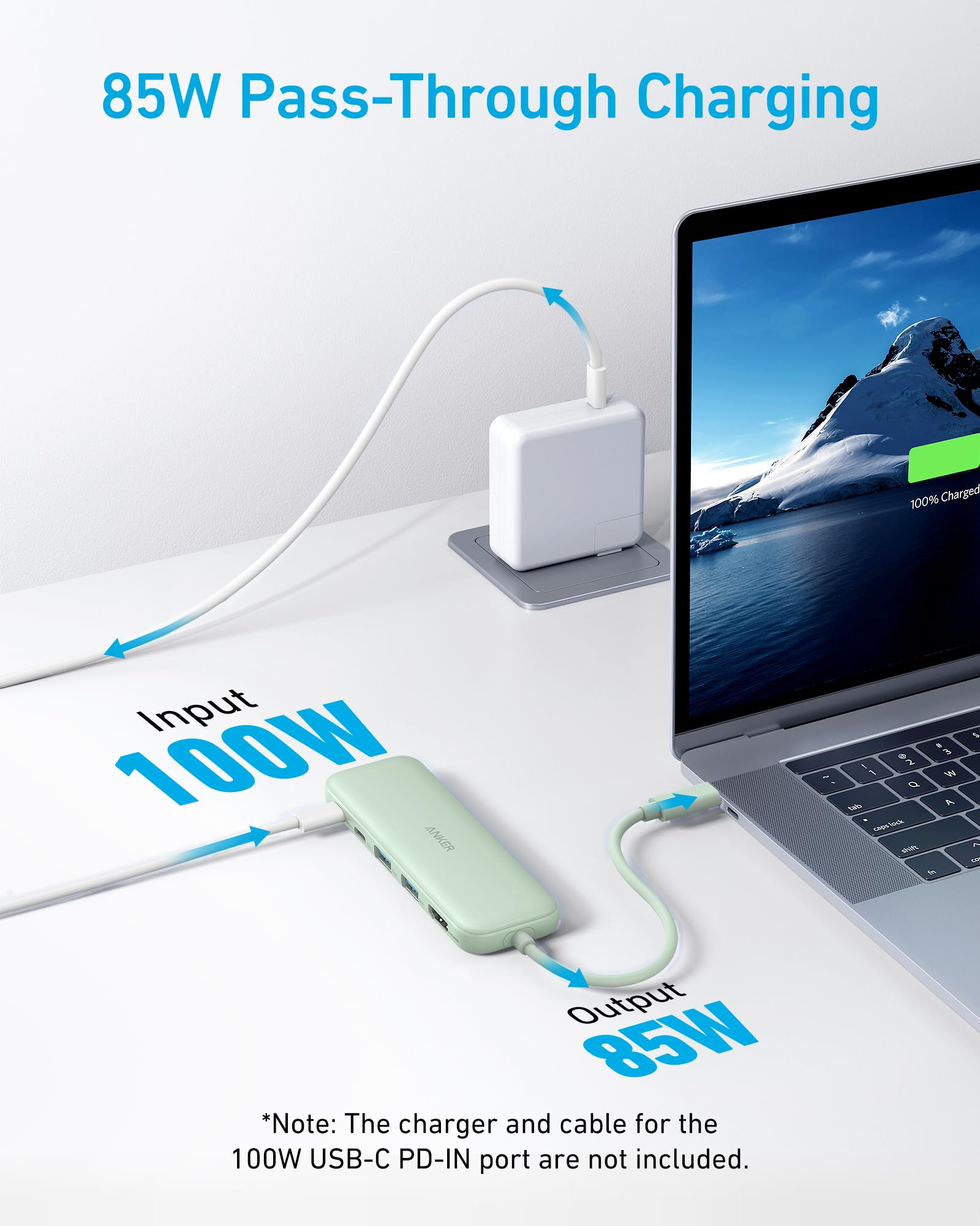 85W pass-through charging setup with laptop and power adapter on a white surface.