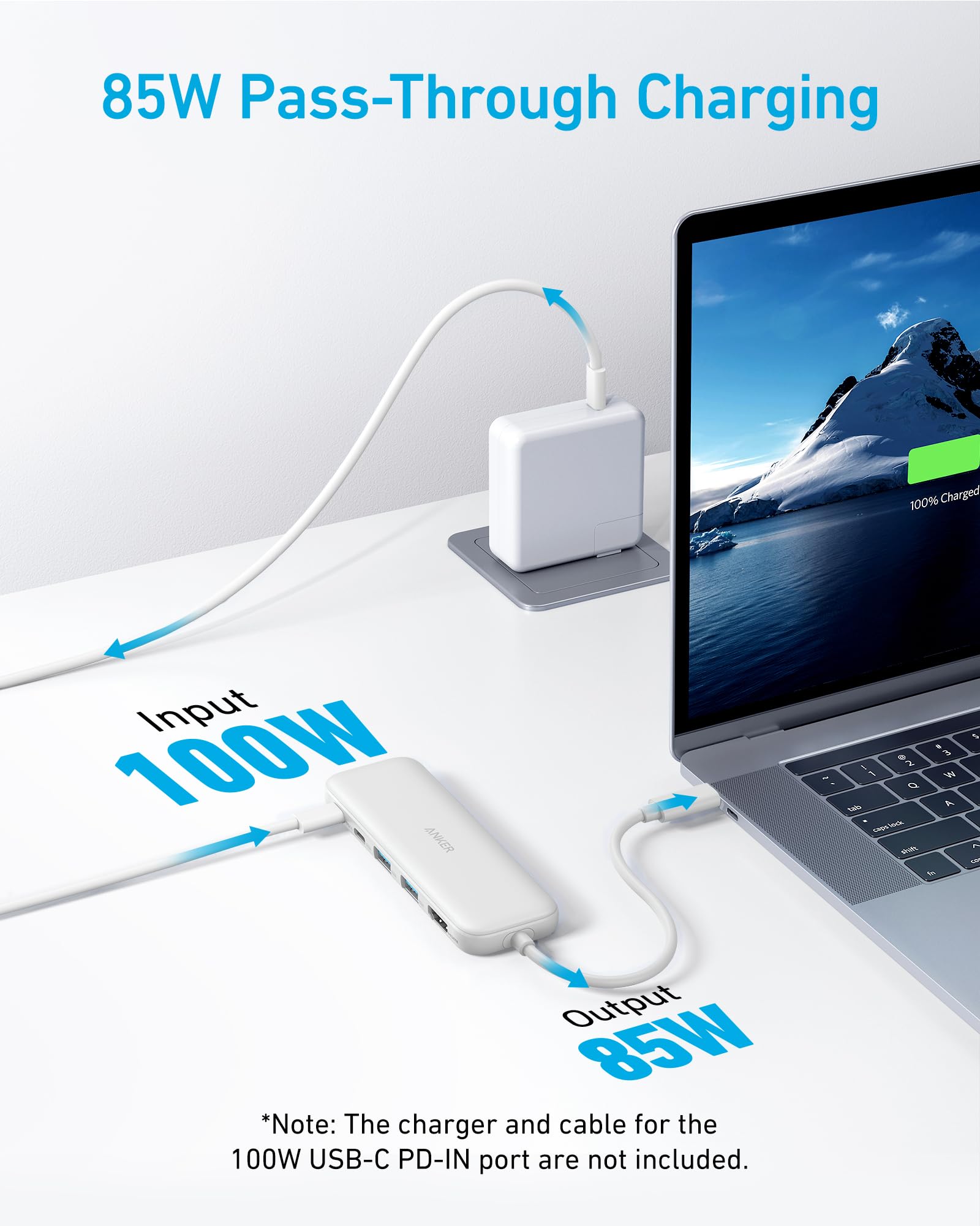 85W pass-through charging setup with laptop and power adapter on a white surface.