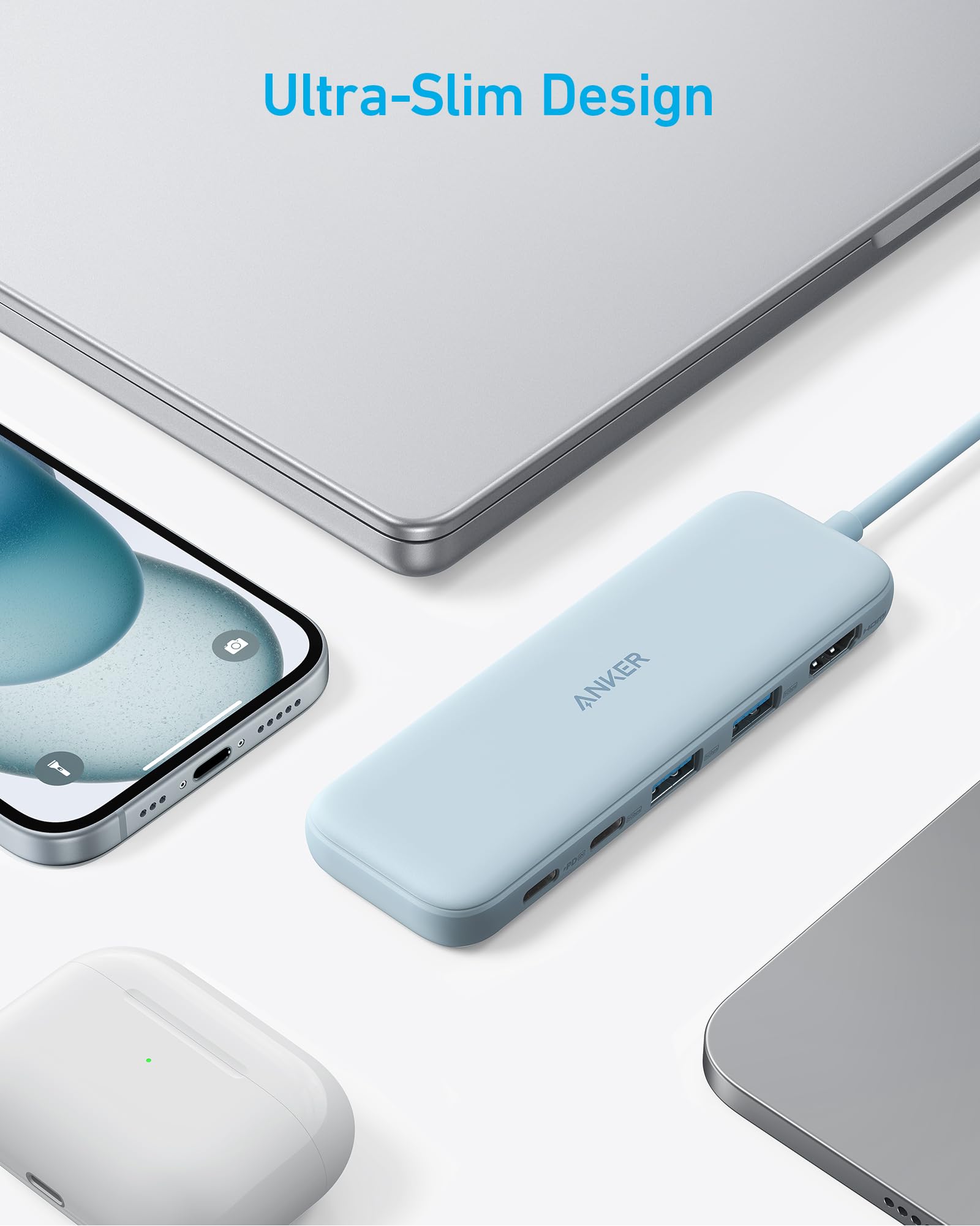 Light blue Anker product with smartphone, laptop, and mouse on a white background