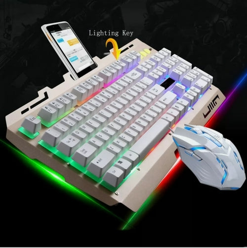 Mechanical keyboard with RGB lighting and a mouse on a dark background