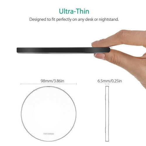 Ultra-thin black object held by a hand with measurements on a white background